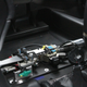 Brake actuators for the autonomous drive in the driver-side floorboard that won’t make it into the production EP9. Photo credit: Stef Schrader